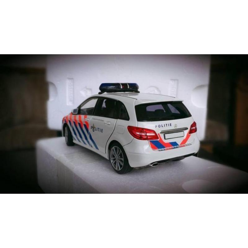 Custom Made Mercedes Politie nieuw in doos Norev
