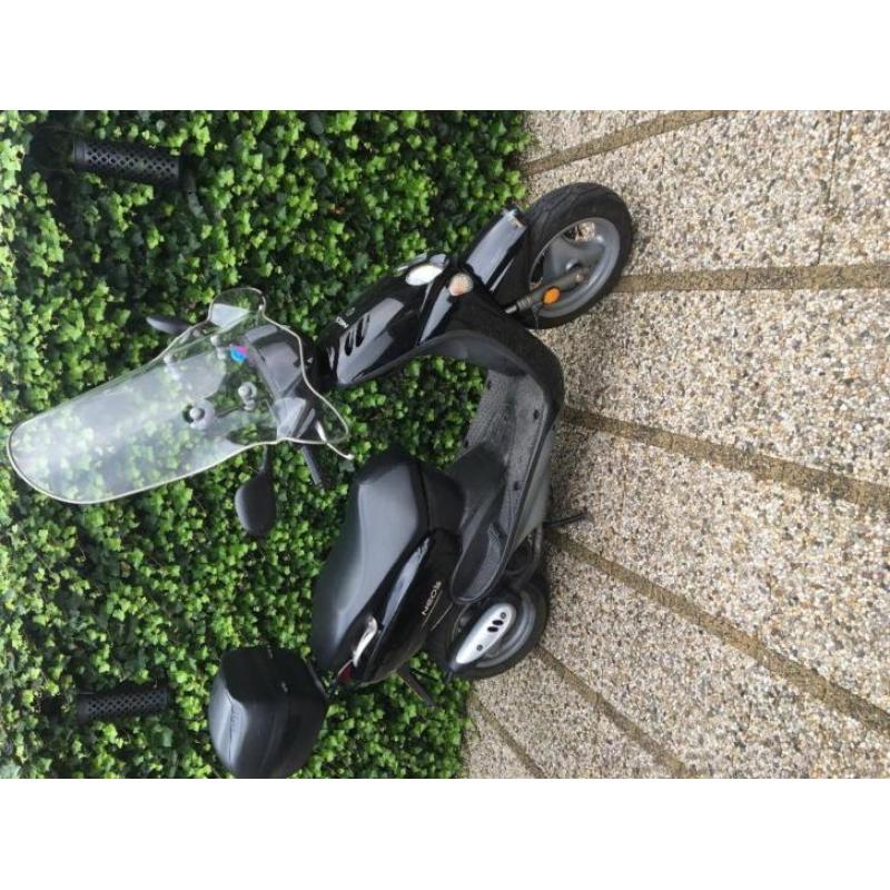 Brommers en scooters