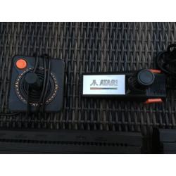 Atari 2600 consoles + games + controllers