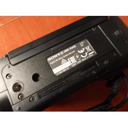 Sony HDR-PJ410 met projector