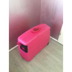 Roze Delsey koffer met wieltjes