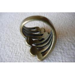 Koperkleurige uitwaaierende ring 18 mm.
